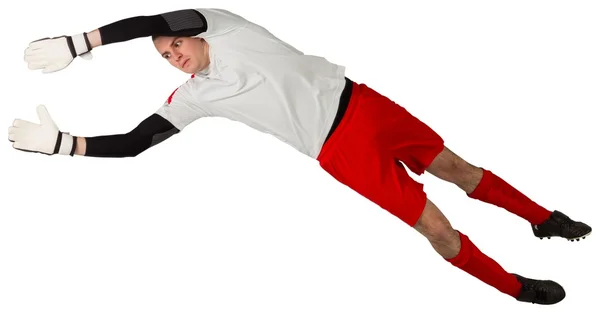 Fit goal keeper jumping up — Stock Photo, Image