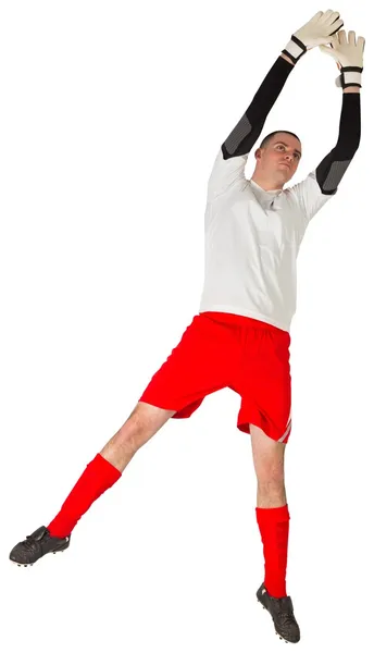 Fit goal keeper jumping up — Stock Photo, Image