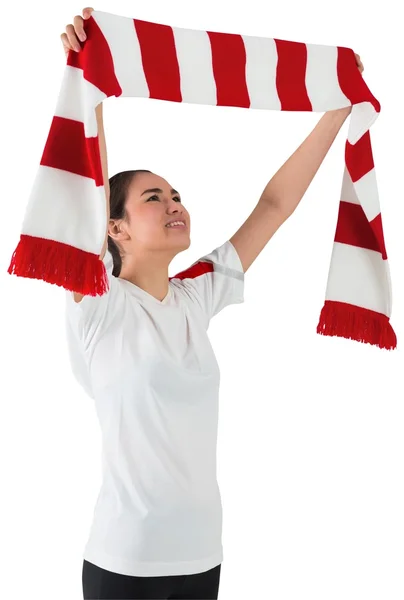 Fan agitando bufanda roja y blanca — Foto de Stock