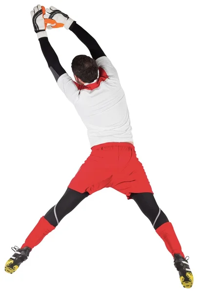 Fit goal keeper jumping up — Stock Photo, Image