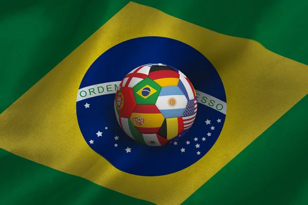 Fußball gegen brasilianische Flagge — Stockfoto