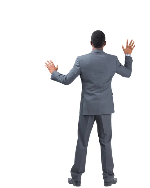 Businessman standing with hands up — Stock Photo, Image