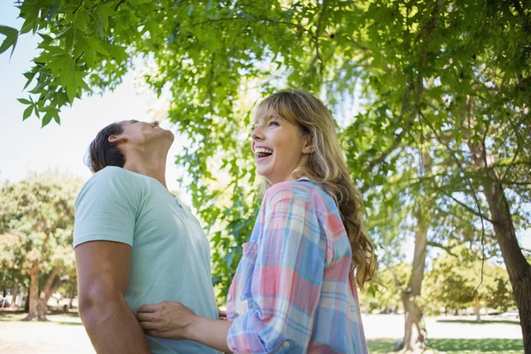 Couple hugging in the park — Stock Photo, Image