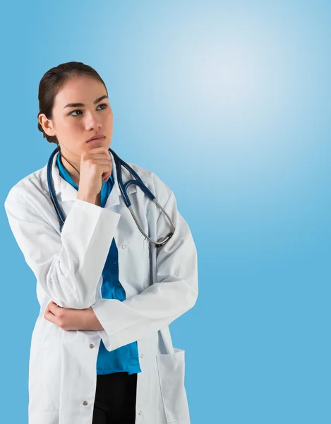 Doctor thinking with hand on chin — Stock Photo, Image