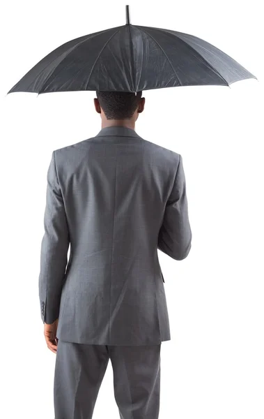 Homme d'affaires debout sous le parapluie — Photo