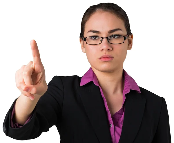 Seriös affärskvinna pekar — Stockfoto
