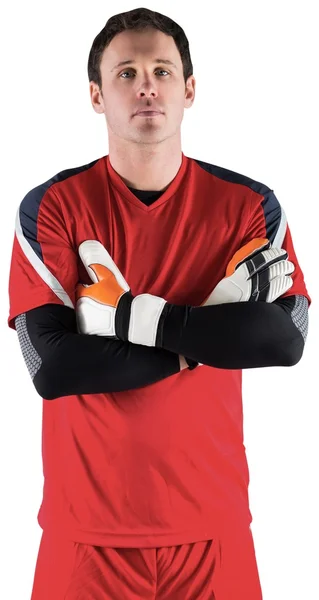Goalkeeper in red looking at camera — Stock Photo, Image