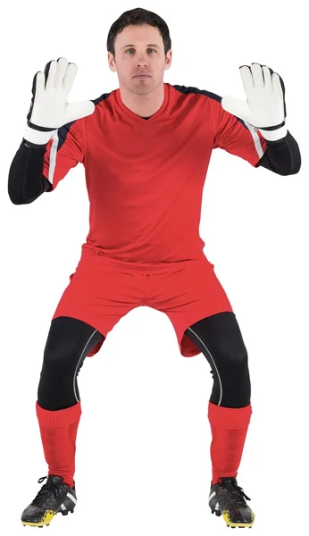 Goalkeeper in red ready to catch — Stock Photo, Image