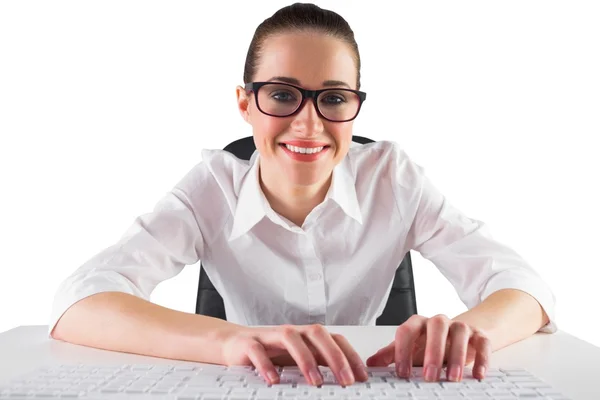 Businesswoman typing on a keyboard — Stock Photo, Image