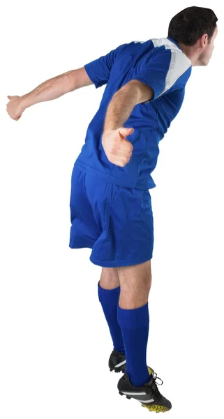 Fußballspieler im blauen Trikot — Stockfoto