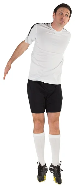 Football player in white jumping — Stock Photo, Image