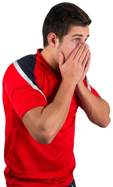 Nervous football fan in red — Stock Photo, Image