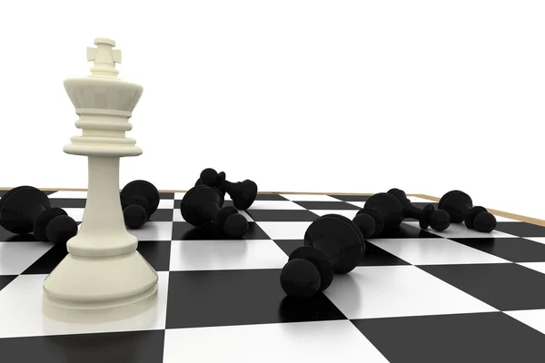 White king standing with fallen black pawns — Stock Photo, Image