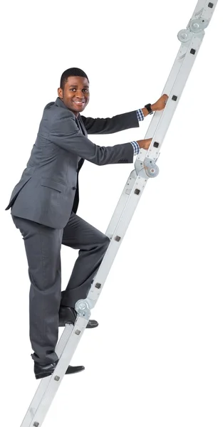 Businessman climbing up ladder — Stock Photo, Image