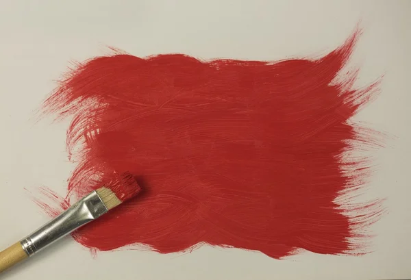 Rode verf met penseel — Stockfoto