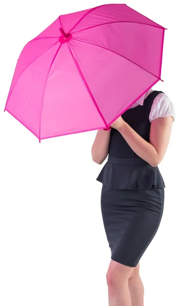 Businesswoman holding umbrella — Stock Photo, Image