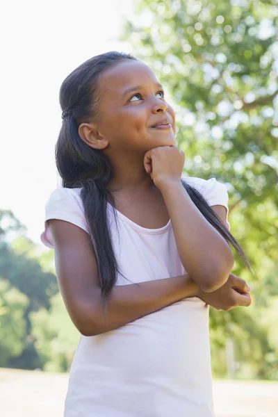 Girl thinking in the park — Stock Photo, Image