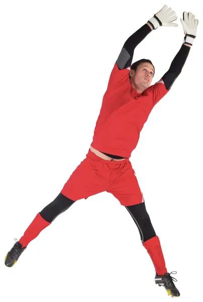 Fit goal keeper jumping up — Stock Photo, Image