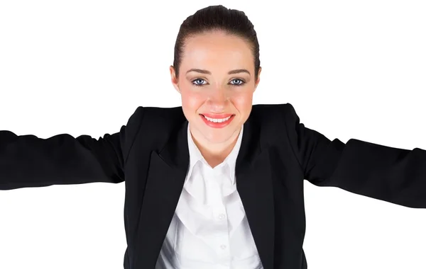 Businesswoman smiling up at camera — Stock Photo, Image