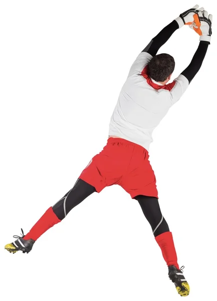 Fit goal keeper jumping up — Stock Photo, Image