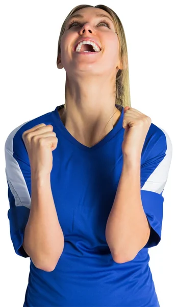 Cheering football fan in blue jersey — Stock Fotó