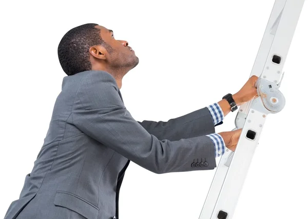 Homme d'affaires grimpant l'échelle — Photo