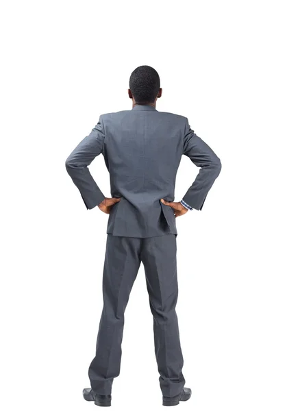 Businessman with hands on hips — Stock Photo, Image