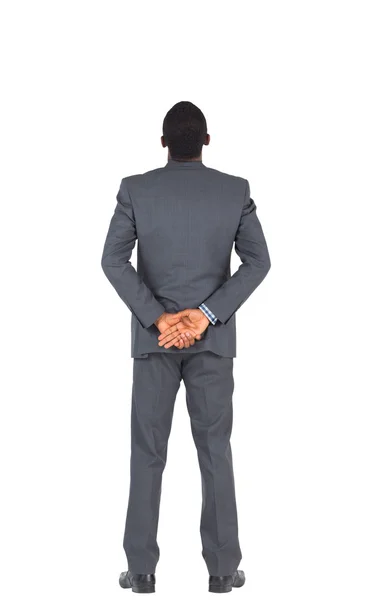 Businessman with hands behind back — Stock Photo, Image