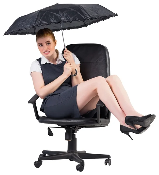 Businesswoman holding umbrella — Stock Photo, Image