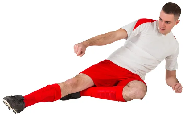 Jugador de fútbol jugando y pateando —  Fotos de Stock