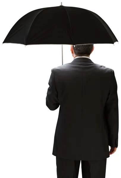 Homme d'affaires mature tenant un parapluie — Photo