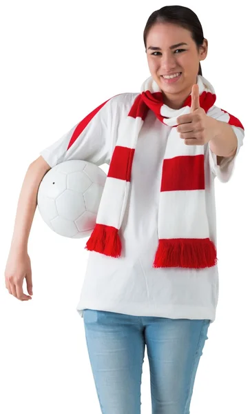 Football fan wearing scarf holding ball — Stock Photo, Image