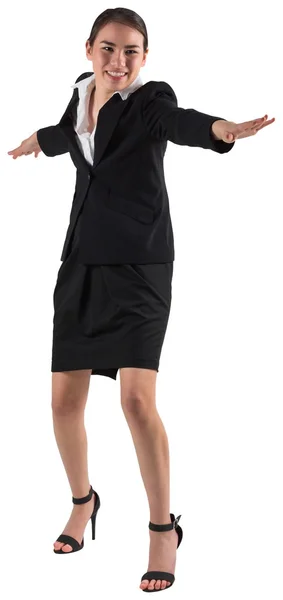 Businesswoman with arms out — Stock Photo, Image