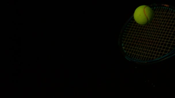 Tennis racket hitting a ball — Stock Video