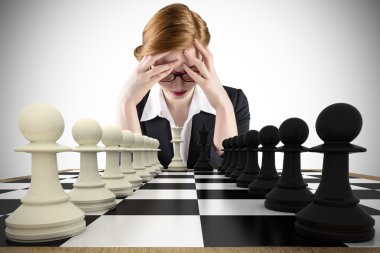 Businesswoman with head in handswith chessboard clipart