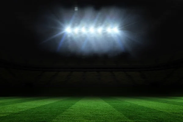 Fußballplatz im Scheinwerferlicht — Stockfoto