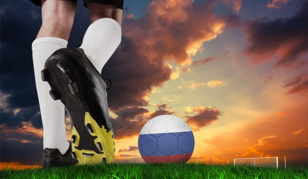 Football boot kicking russia ball — Stock Photo, Image