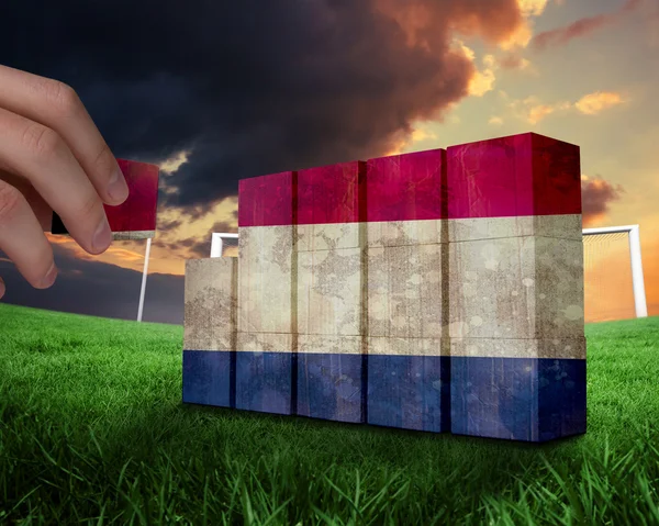 Mano pared de construcción de la bandera de los Países Bajos — Foto de Stock