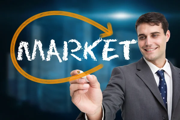 Podnikatel psaní slovo trh — Stock fotografie
