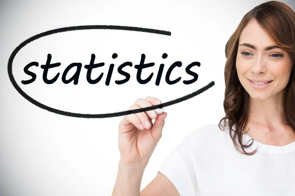Affärskvinna skriva ordet statistik — Stockfoto