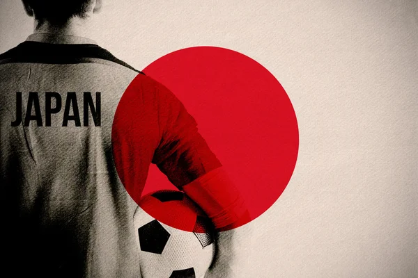 Japan football player holding ball — Stock Photo, Image