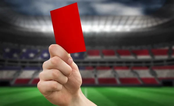 Hand holding up red card — Stock Photo, Image
