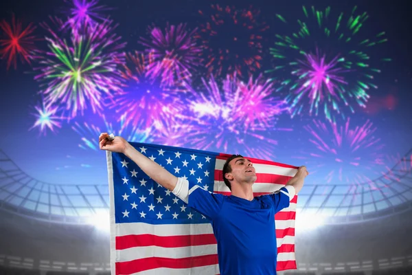 American soccer fan holding flag — Stock Photo, Image