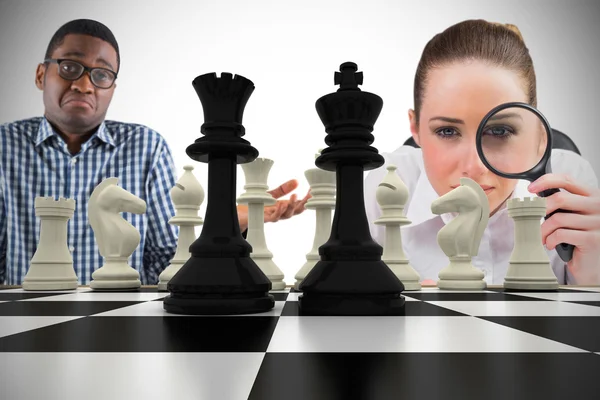 Business people with chessboard — Stock Photo, Image