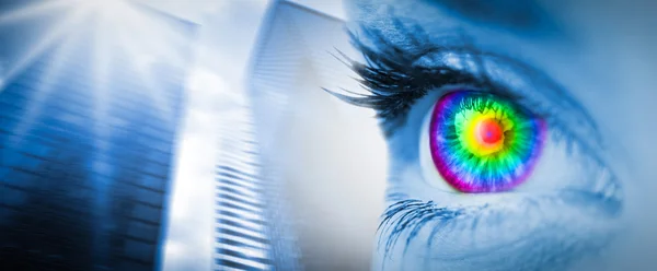 Pyschedelic eye on blue face — Stock Photo, Image