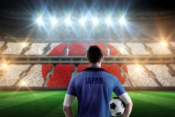 Japan football player holding ball — Stock Photo, Image