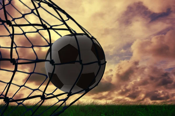 Football in back of the net — Stock Photo, Image