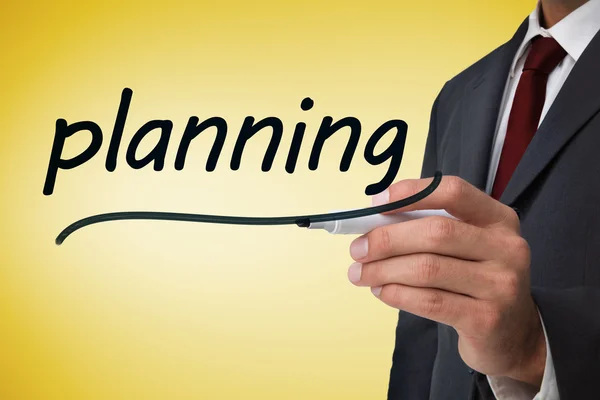 Affärsman skriva ordet planering — Stockfoto