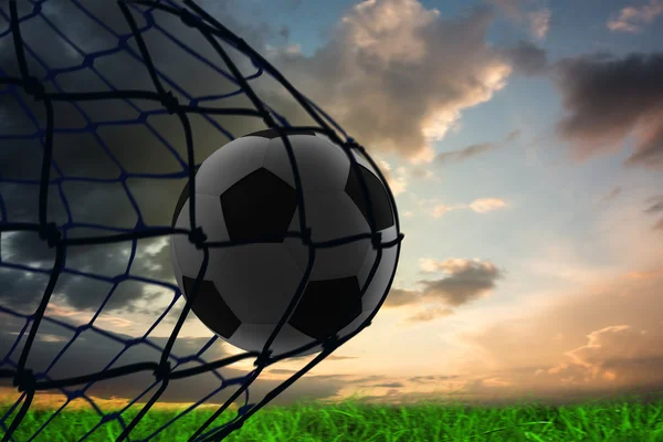 Football in back of the net — Stock Photo, Image