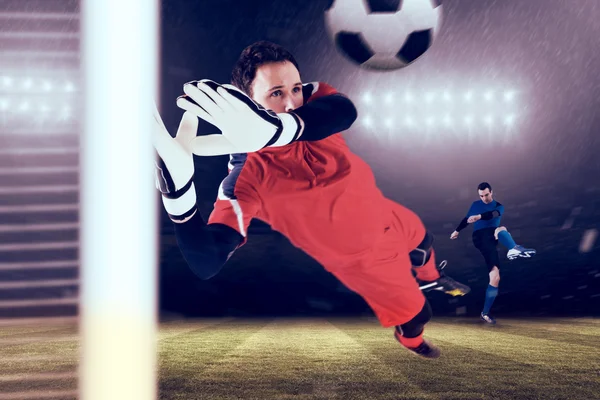 Fit goal keeper jumping up — Stock Photo, Image